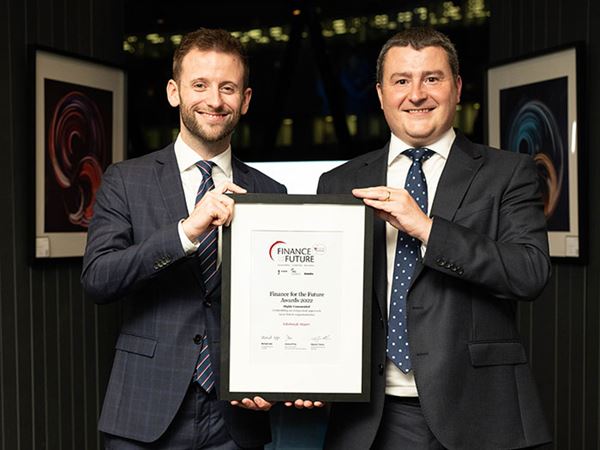 Representatives from Edinburgh Airport holding their award certificate.