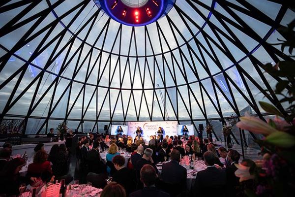 A photograph of the awards ceremony taking place inside 30 St Mary Axe.