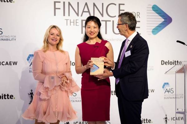Photo of winner receiving award