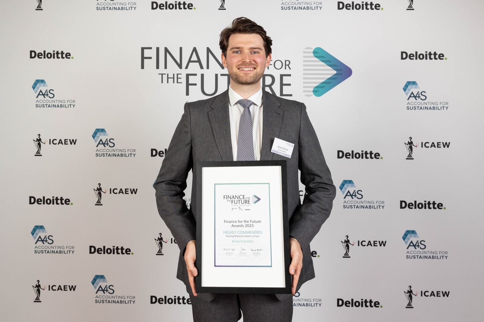 Recipient of award certificate 