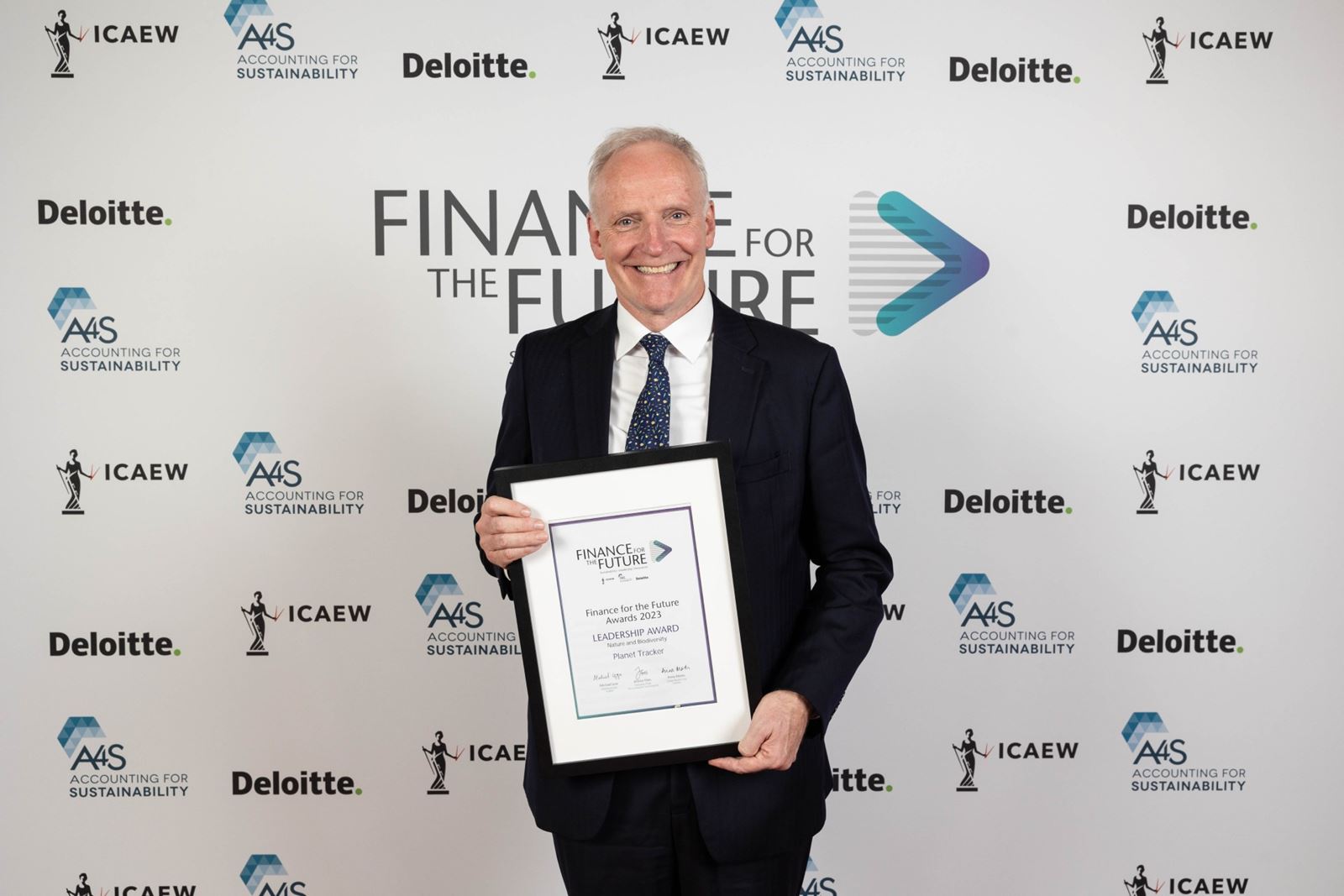 Recipient of award certificate 