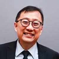 Headshot of Kok Yong